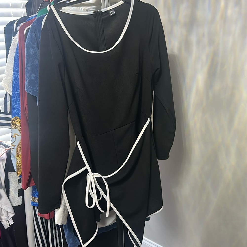 Black one piece jumper with a skort